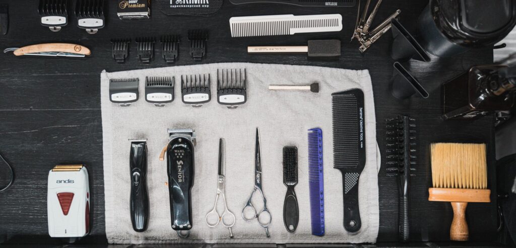 Professional grooming tools including clippers and brushes